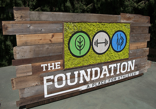 Custom wood moss logo using reclaimed wood by Urban Garden Studio Living wall, reclaimed wood, moss, custom logos, office design, interior design, logo in moss, custom signage, vertical wall garden, moss logo, custom reclaimed wood signage, reclaimed wood projects, barn wood signs, custom reclaimed wood signs
