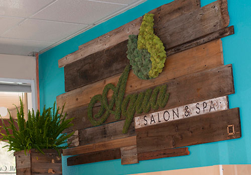 Vertical wall garden with moss logo and reclaimed wood by Urban Garden Studio Vertical wall garden, Living wall, reclaimed wood, moss, succulents, ferns, air plants, planters, custom logos, office design, interior design, logo in moss, moss logo, living garden wall art, reclaimed wood projects, barnwood signage, reclaimed wood signage, wall signs, sign wall decor