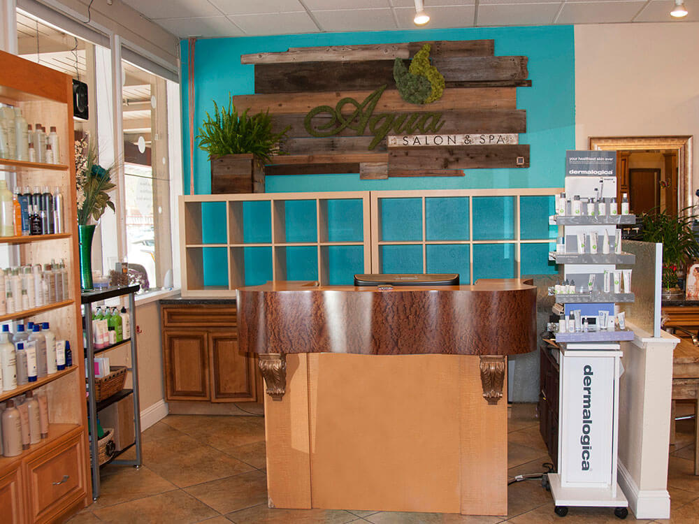 Aqua Salon and Spa Living wall, air plants, reclaimed wood, planters, ferns, succulents