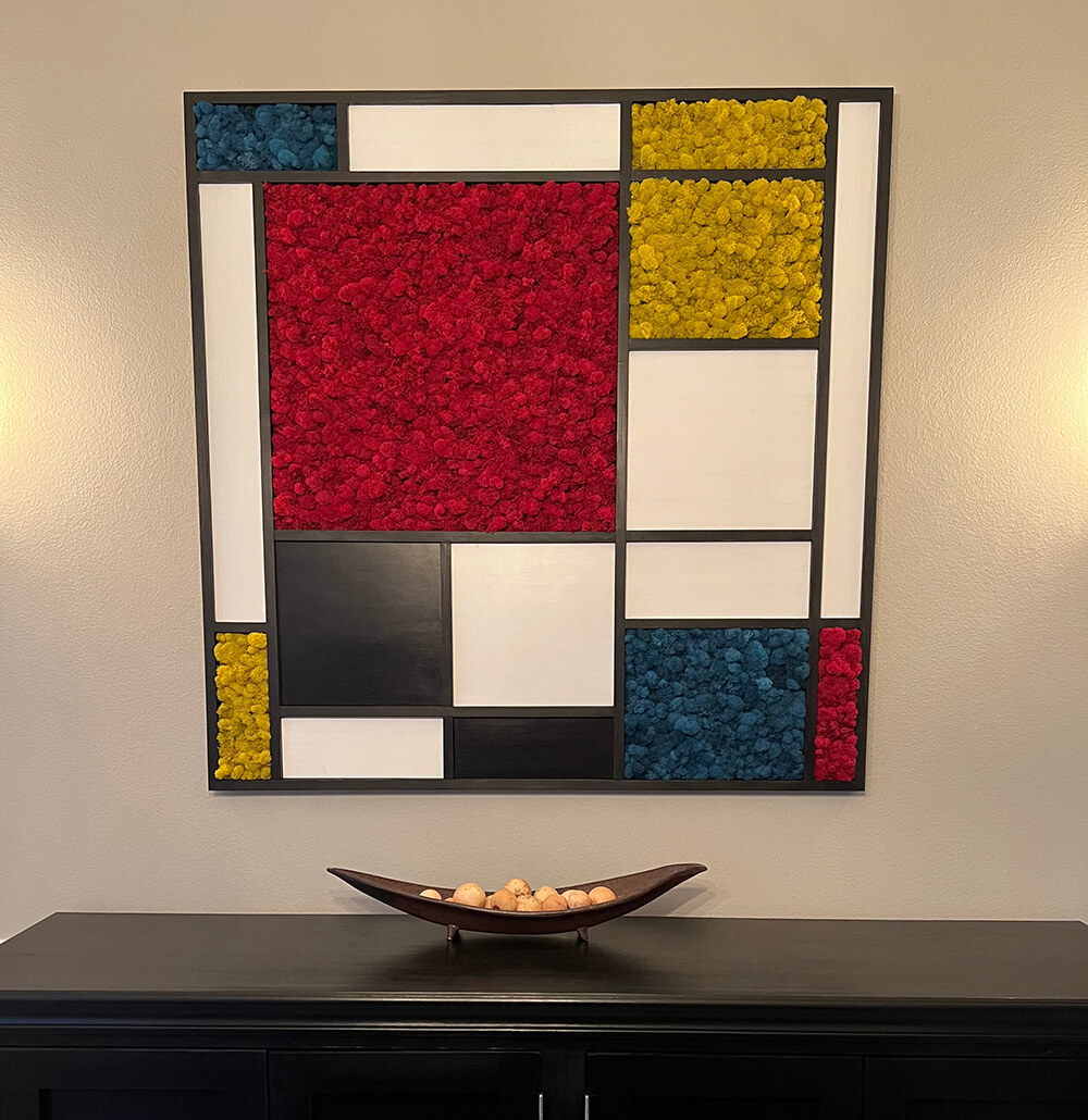 Mondrian inspired moss wall art created with and various colors of reindeer moss